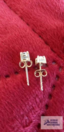 Two gold colored and clear gemstone earrings, marked 10K, backs are also marked 10K, total