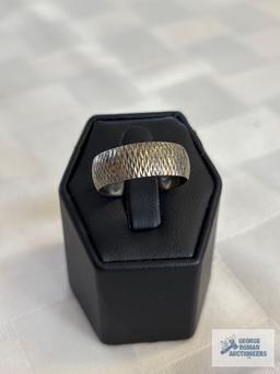 Silver colored band ring, marked 925 Turkey, approximate total weight is 7.45 G