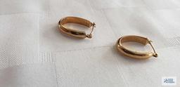 Gold colored hoop earrings, marked 14K, approximate total weight 1.27 G
