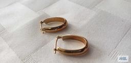 Gold colored hoop earrings, marked 14K, approximate total weight 1.27 G