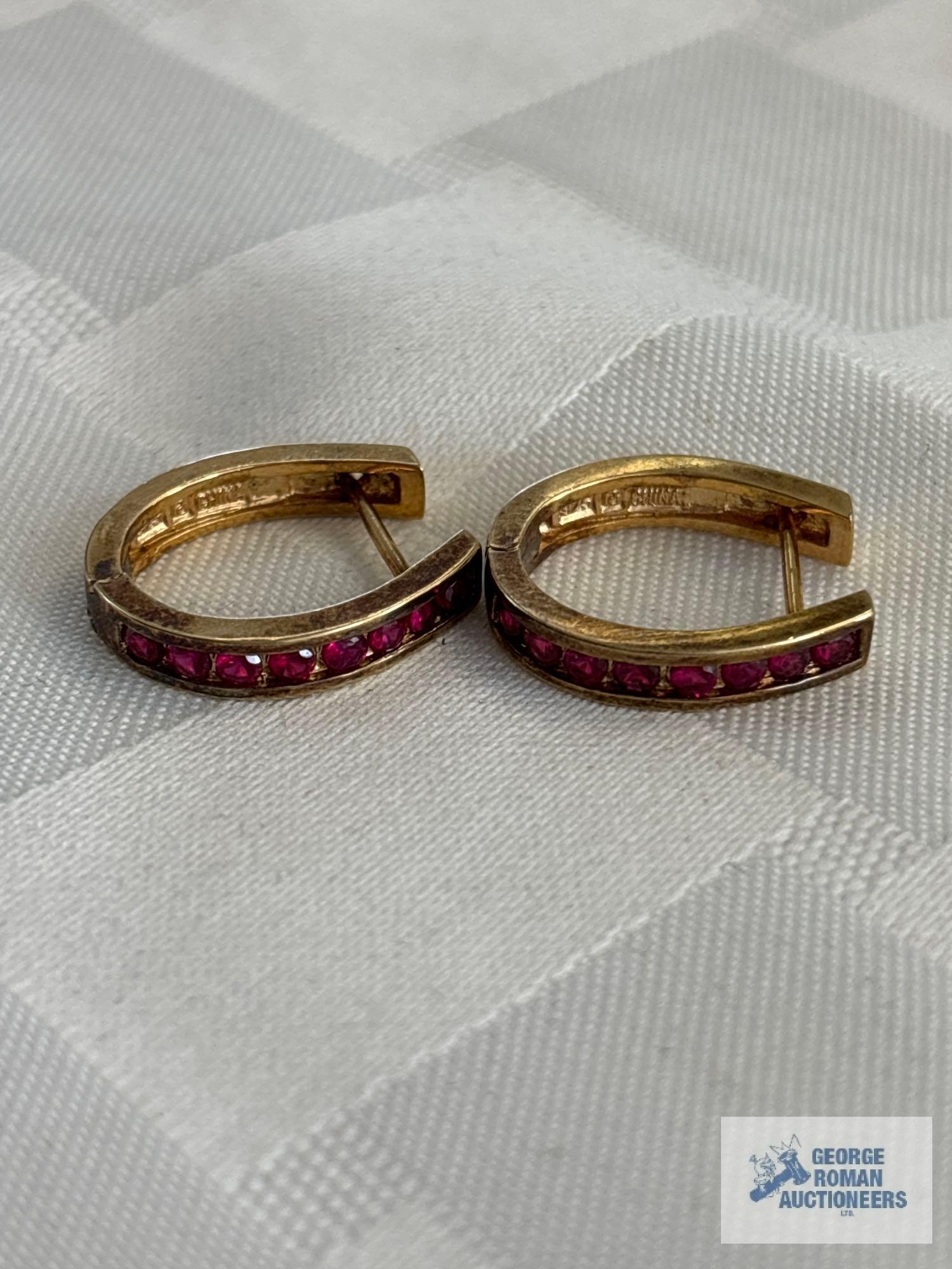 Gold colored earrings with reddish pink gemstones, marked 925, approximate total weight 4.95 G