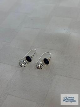 Silver colored with blue stone dangle earrings, marked 925