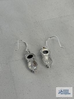Silver colored with blue stone dangle earrings, marked 925