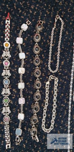 Silver colored costume jewelry bracelets