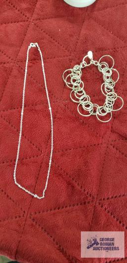 Silver colored circle link bracelet, marked Alfani....Silver colored chain, no markings.