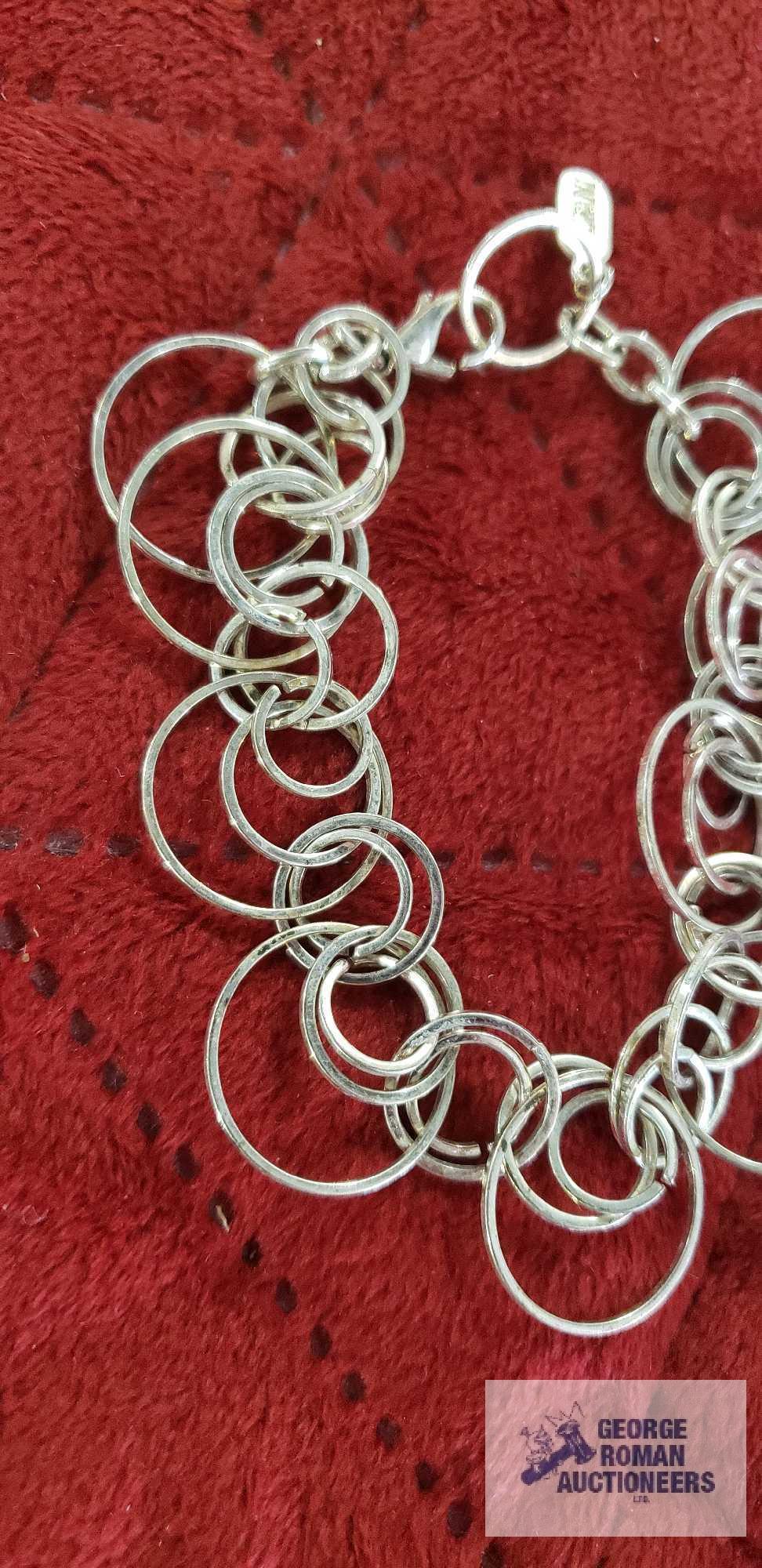 Silver colored circle link bracelet, marked Alfani....Silver colored chain, no markings.