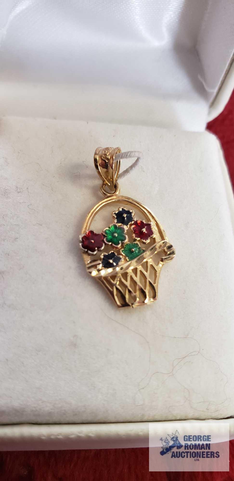 Gold colored basket of colorful flowers...pendant, marked 14K, approximate total weight is 1.31 G