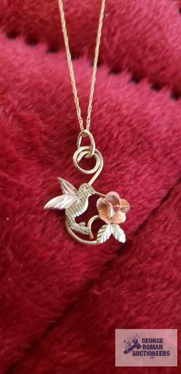 Black hills gold...hummingbird pendant, marked 10K on gold colored chain, marked 10K, total