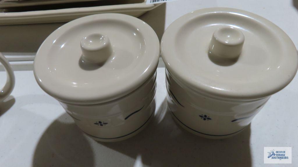 Longaberger...Pottery crocks with lids