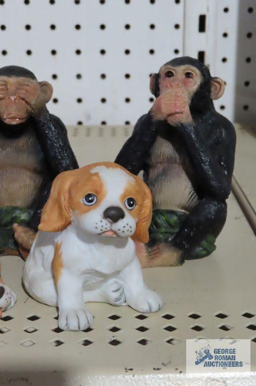 Dog and monkey figurines ...