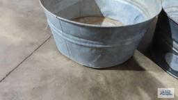 Galvanized...wash tubs, number 2103 and number two, has holes drilled in bottom