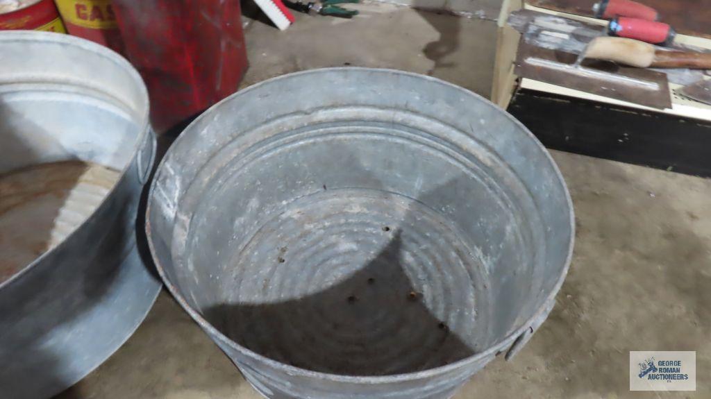 Galvanized...wash tubs, number 2103 and number two, has holes drilled in bottom