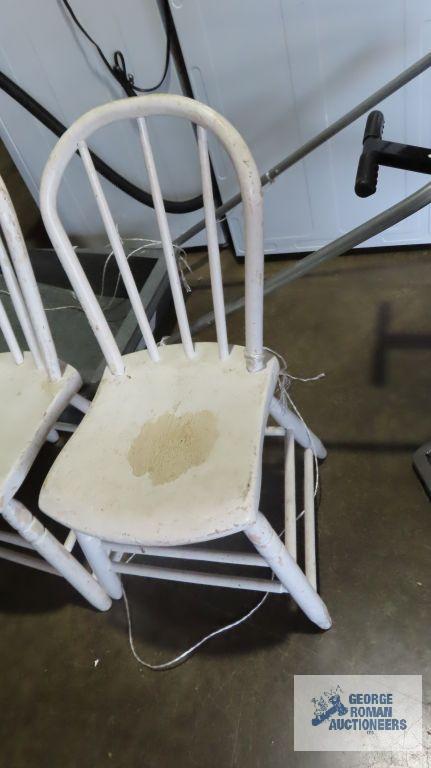 Two painted white wooden chairs