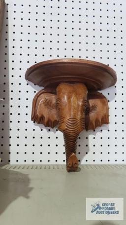 Wood carved elephant shelf