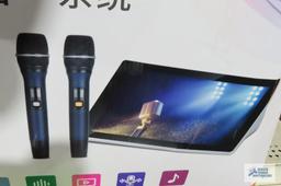 Karaoke machine with mics