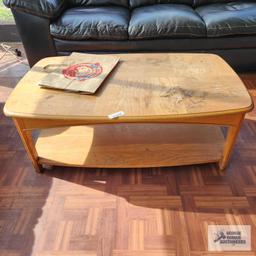 Faux leather sofa, love seat, oak finish coffee table and decorative armchair