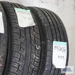 Lot of assorted tires on wooden rack