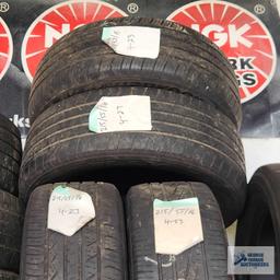 Lot of assorted tires on wooden rack