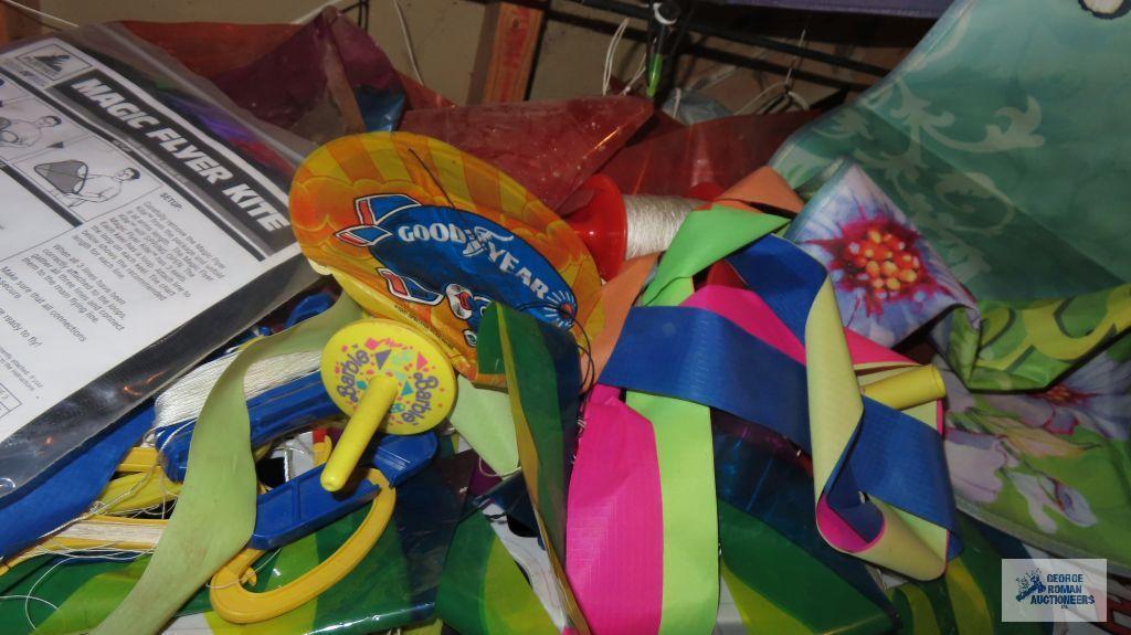 Assorted kites and kite accessories