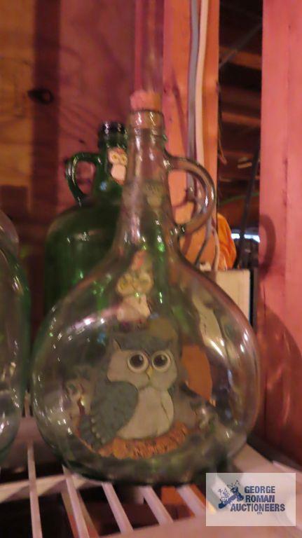 Four decorative glass jugs