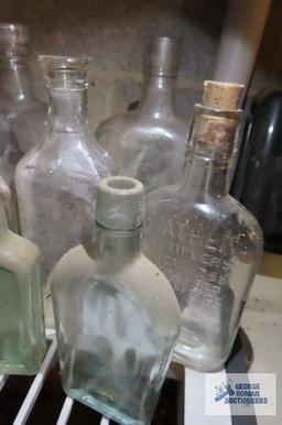 lot of antique clear glass bottles