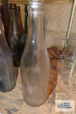 Three antique bottles