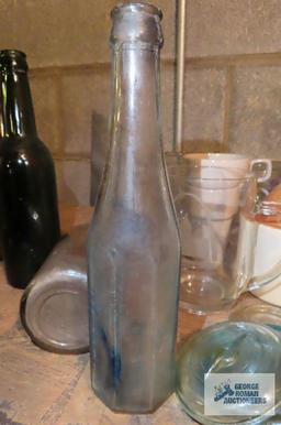 Three antique bottles