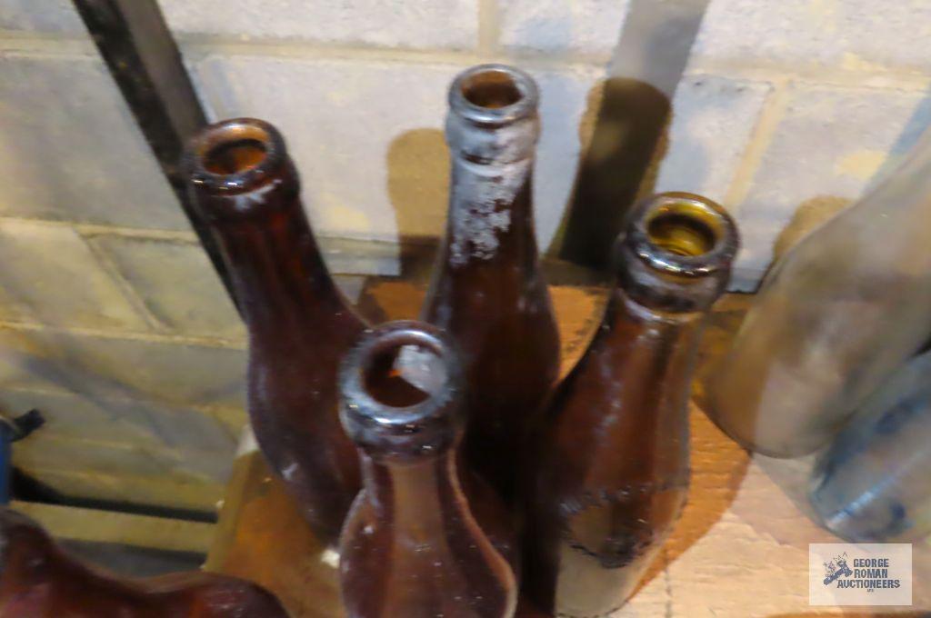 Three Labor Brewing Company antique bottles and three Yough Brewing Company antique bottles