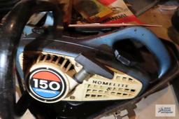vintage Homelite 150 automatic chainsaw with accessories and manual