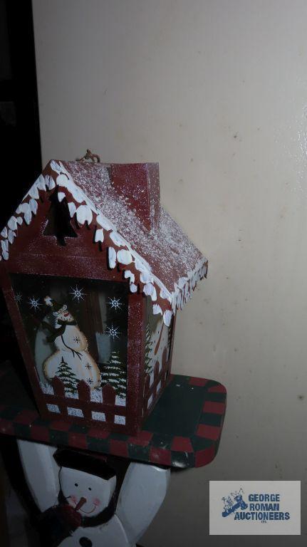 lot of wooden Christmas decorations, basket, and snowman birdhouse decoration