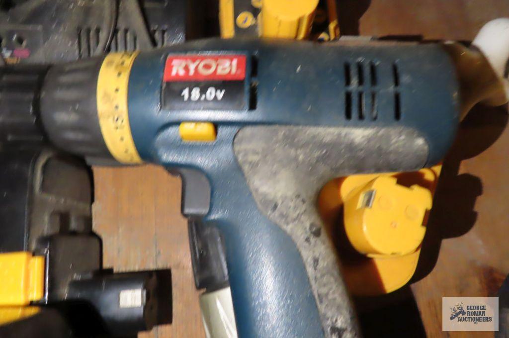 Two Ryobi drills with four batteries and two chargers