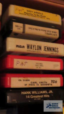 lot of 8-track tapes with electrophonic vintage 8-track player