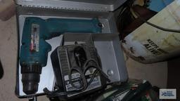 Two Black and Decker drills with four batteries, two chargers and two cases. Includes Makita