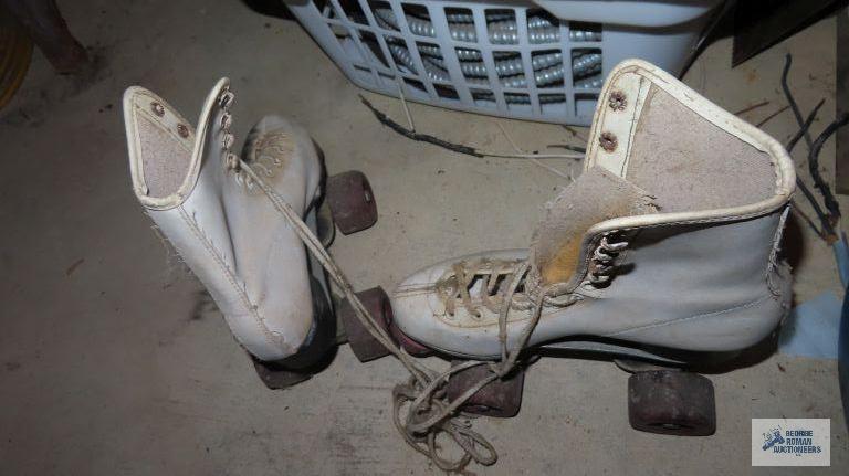 pair of vintage roller derby roller skates. no size