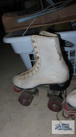 pair of vintage roller derby roller skates. no size