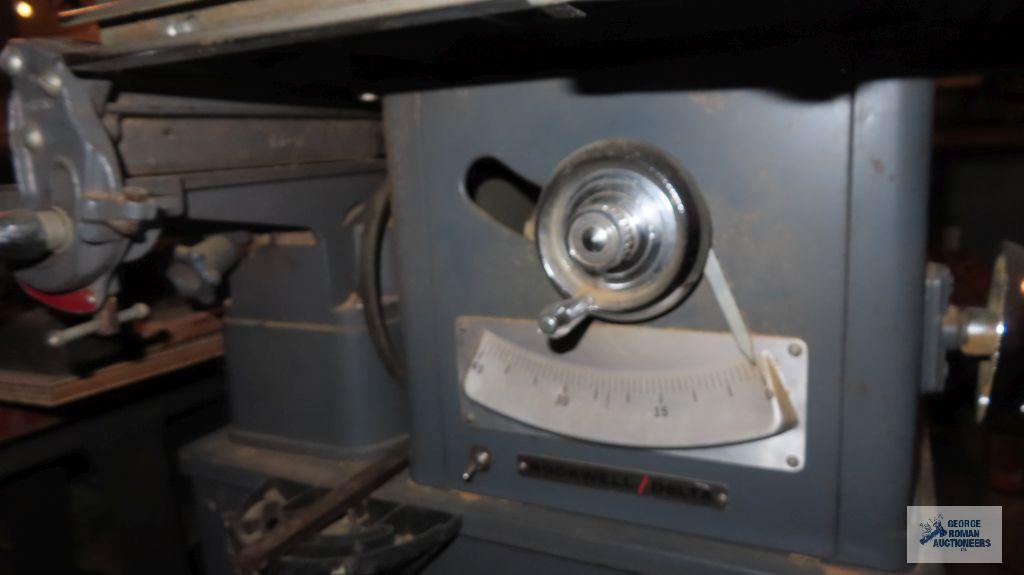 vintage Rockwell table saw and 4-in Joiner combo. unit is in basement. very heavy. bring tools for