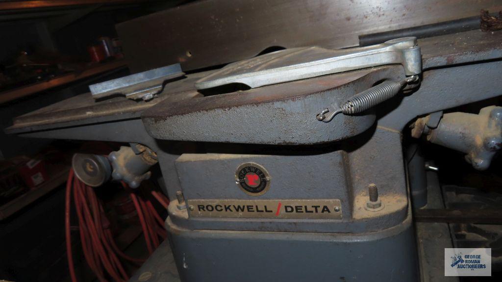 vintage Rockwell table saw and 4-in Joiner combo. unit is in basement. very heavy. bring tools for