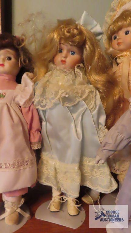 Four porcelain dolls