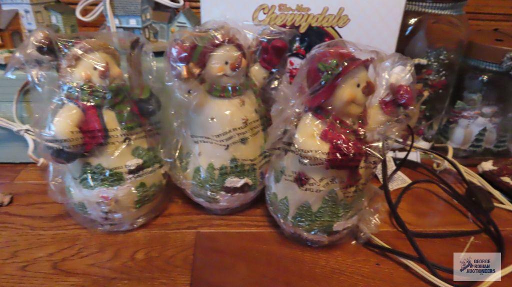 Lot of Christmas figurines and houses