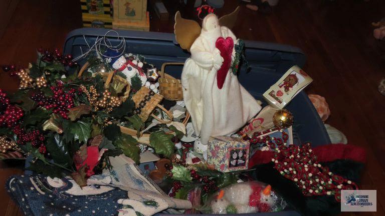 Tote of Christmas decorations, including runners and Angel and others