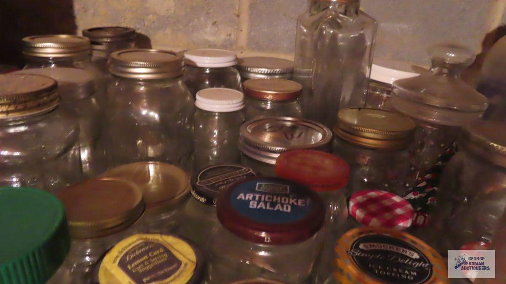 lot of mason jars and other jars