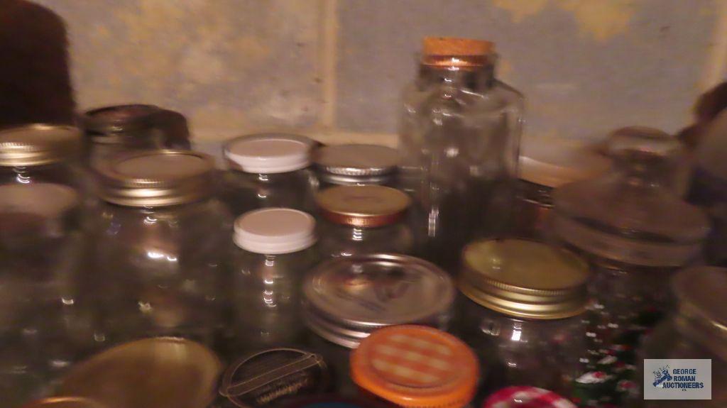 lot of mason jars and other jars