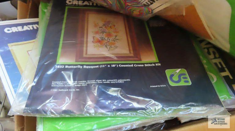 Box lot of sewing and embroidery and plastic craft supplies and patterns