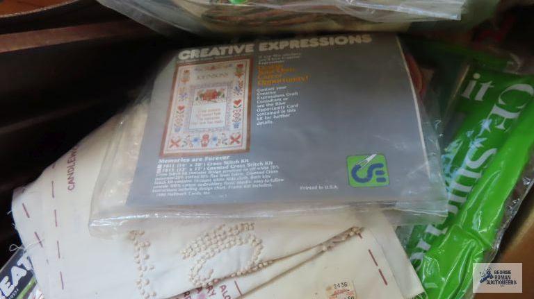 Box lot of sewing and embroidery and plastic craft supplies and patterns