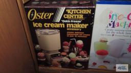 Oster...ice cream maker, snow cone machine, and cutting boards