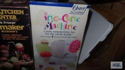 Oster...ice cream maker, snow cone machine, and cutting boards