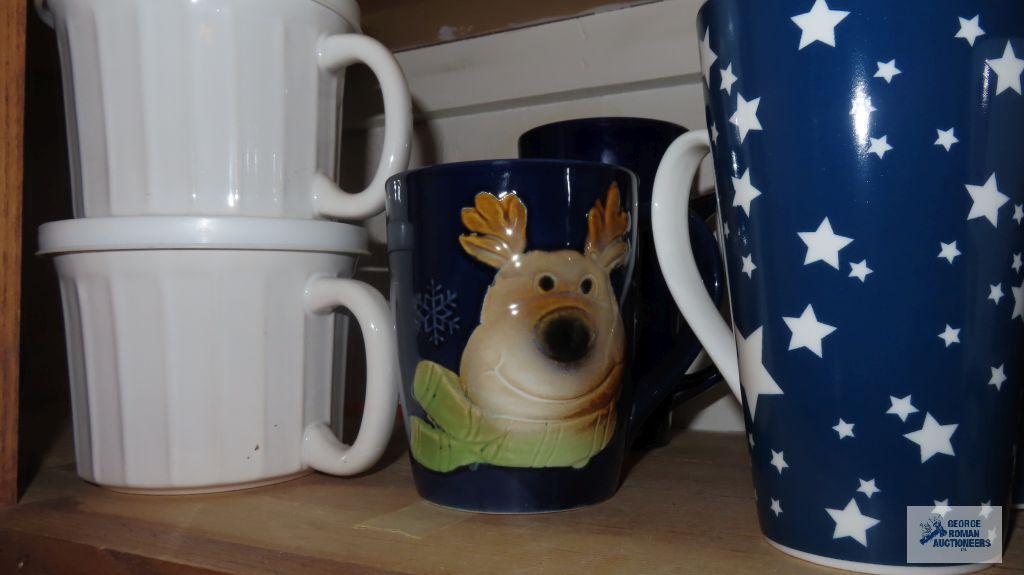 Cupboard lot of decorative mugs and soup bowls