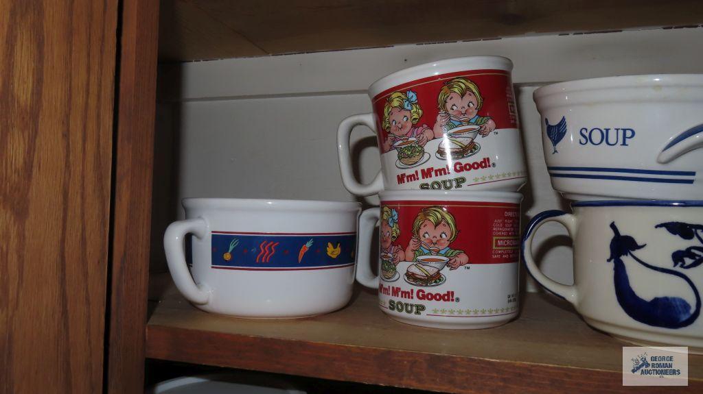 Cupboard lot of decorative mugs and soup bowls