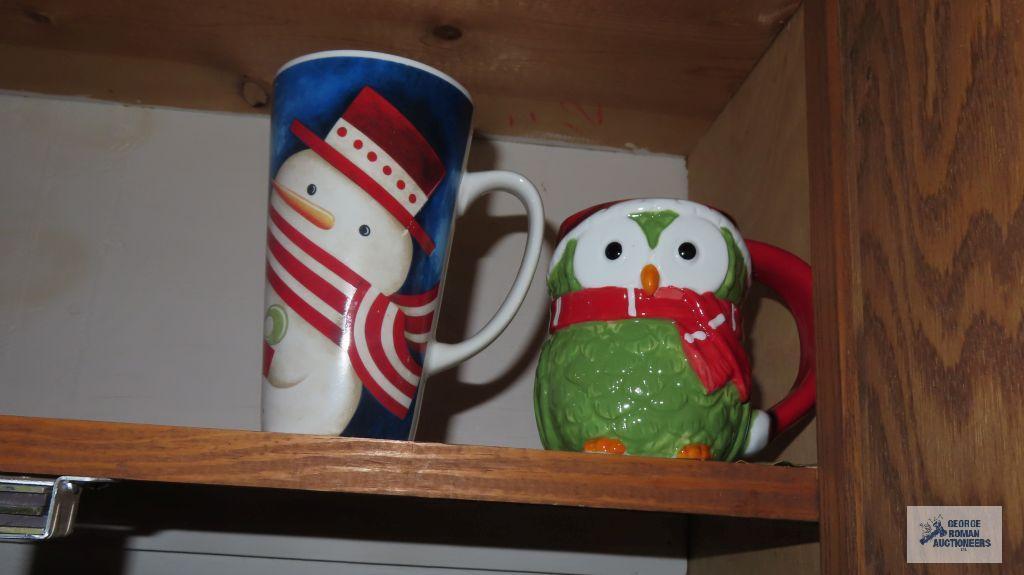 Cupboard lot of decorative mugs and soup bowls