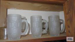 Cupboard lot of assorted glassware and frosted mugs